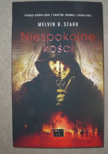 Okładka: Melvin R. Starr - Niespokojne kości